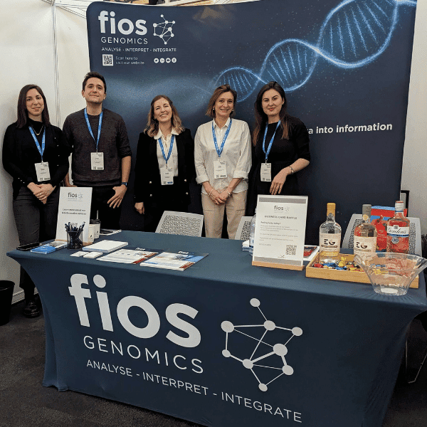 Member of the Fios genomics team pictures need to the Fios Genomics exhibition booth at the festival of Genomics and Biodata 2023